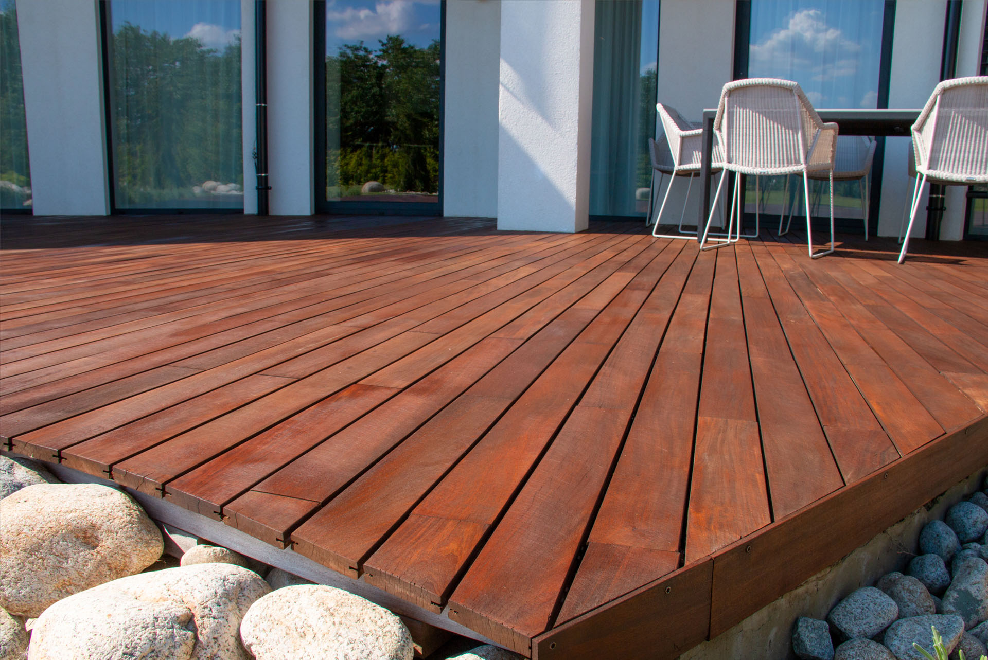 Timber Decking wooden deck boards hardwood pressure treated smooth dark wood patio